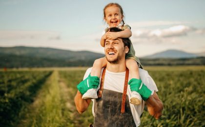 Photo of farmer with child